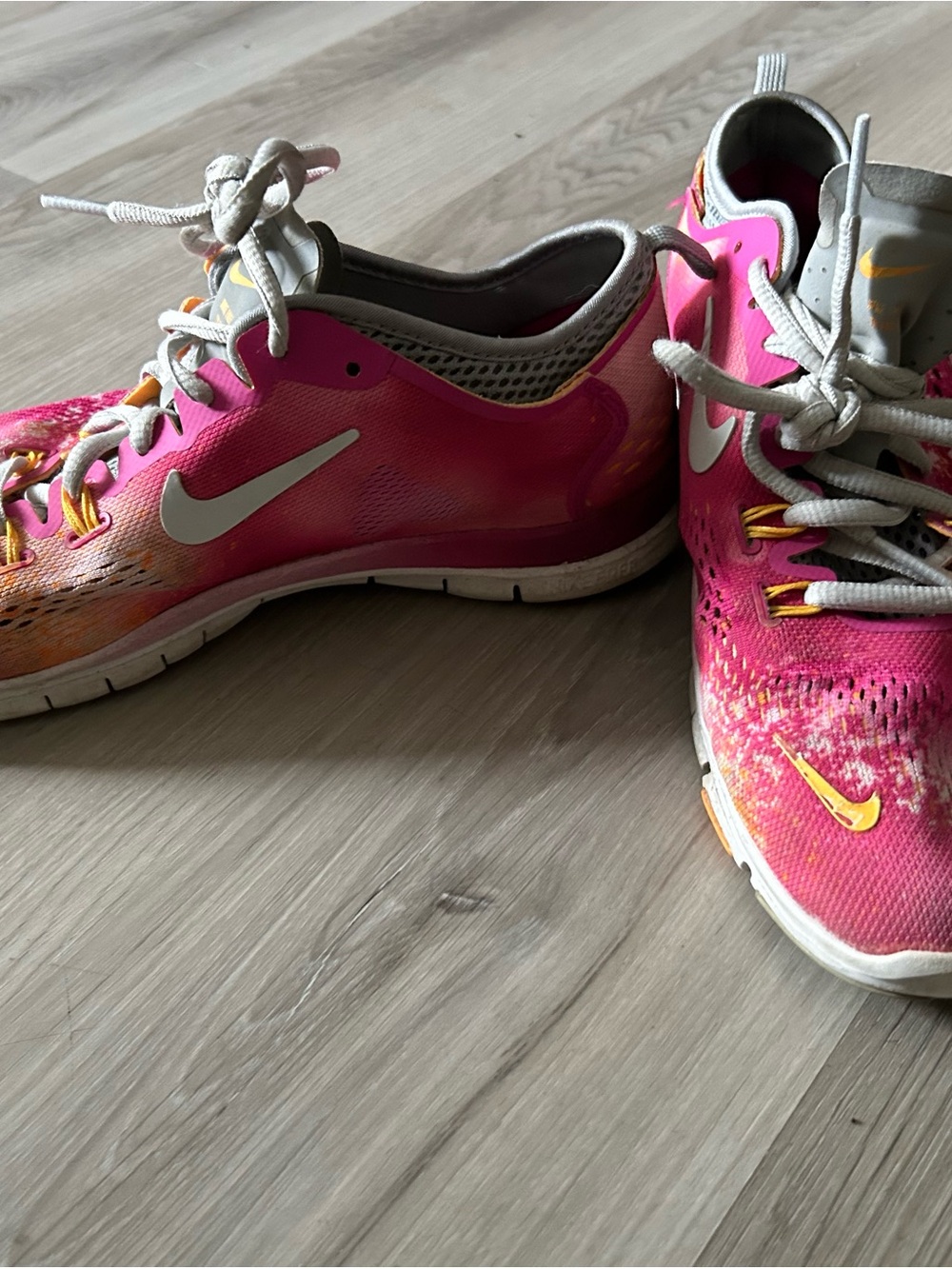 Nike Women’s Pink and Yellow Athletic Running Shoes